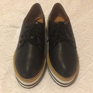 Size 7.5 platform sneakers! Never worn!